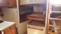 Custom:Looking aft across stbd side. Engine box, chart table
