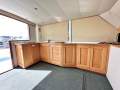Mews 40 Flybridge Sports Fisher "Single Diesel Shaft with diesel genset ":Port side galley