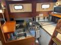 Jean Vignes 55 - steel 1984 cutter with 5-cabin layout
