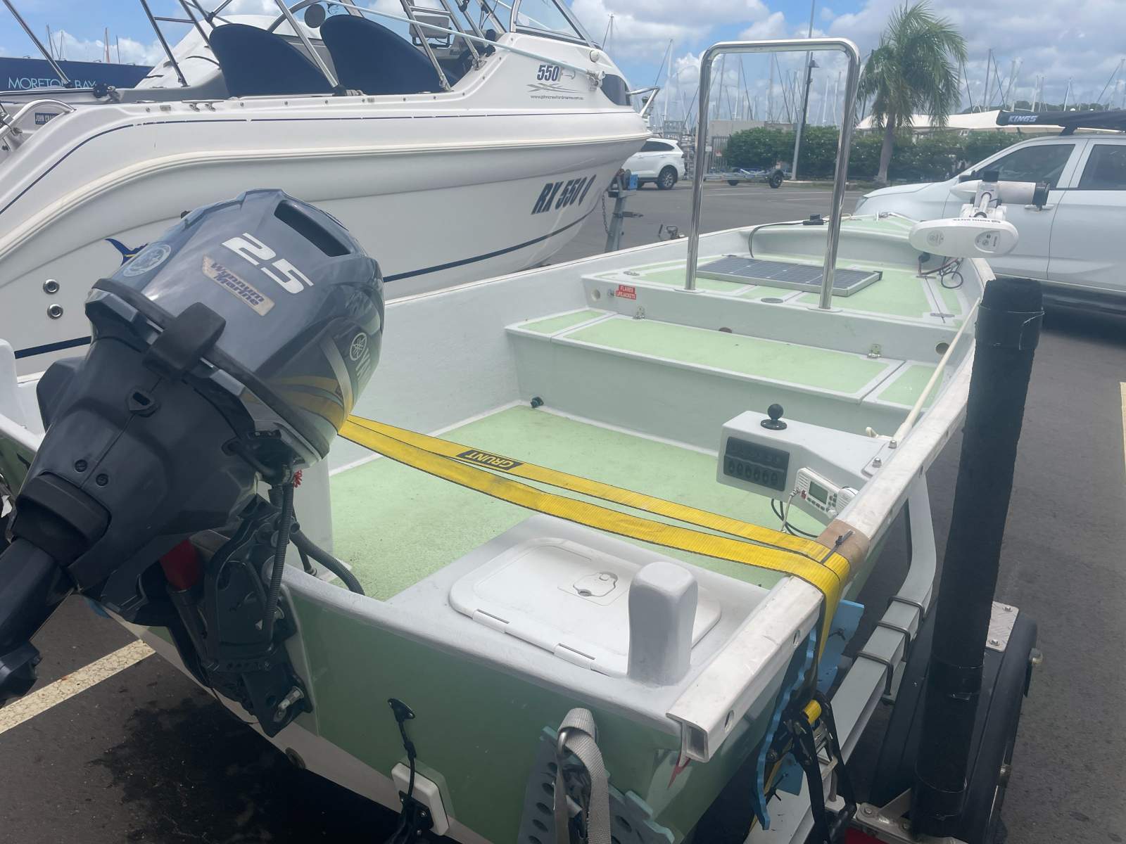 Custom fiberglass tiller steer fishing boat