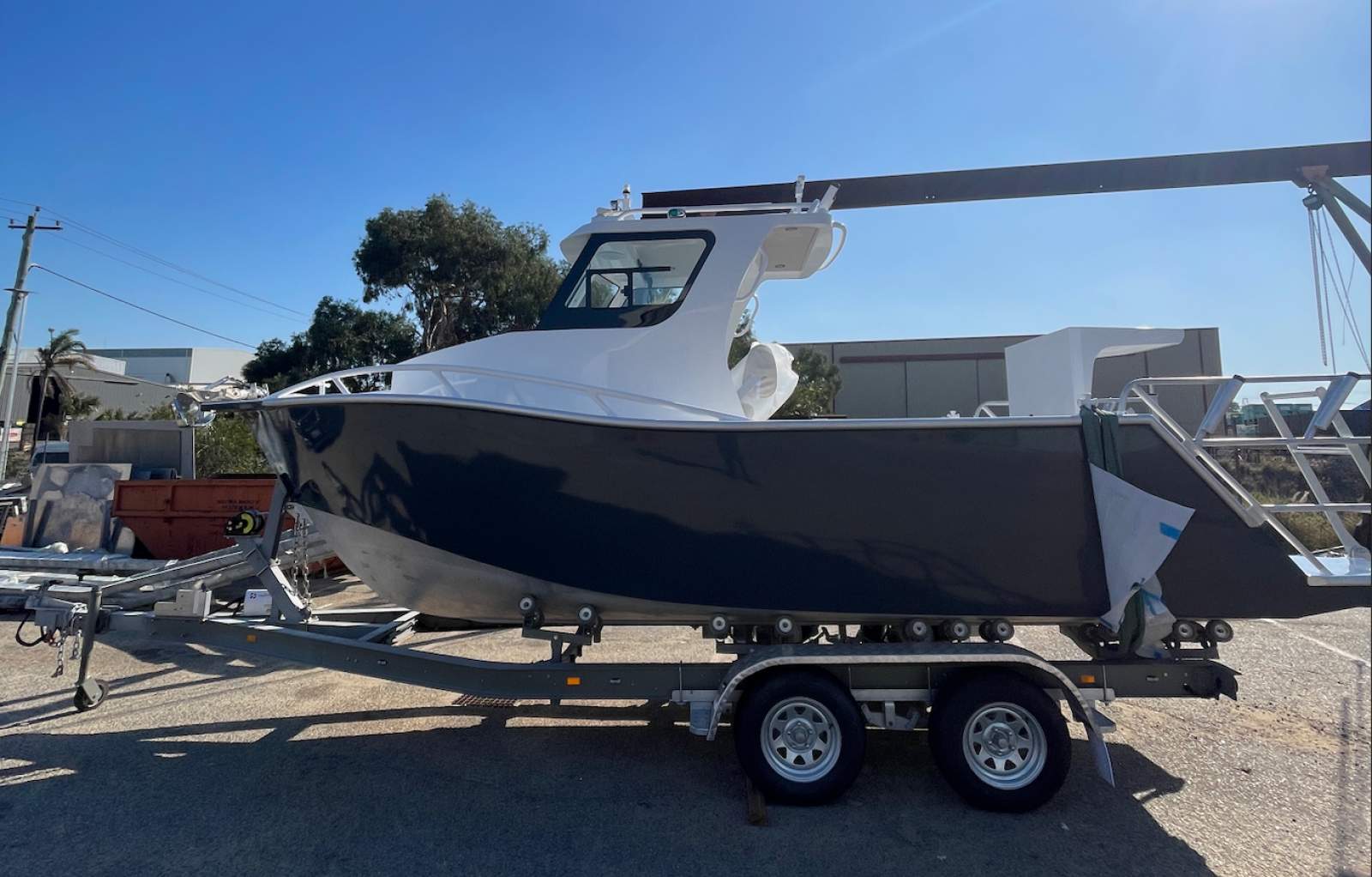 Lux Custom Boats 6100WA With added transom cage and double ladder