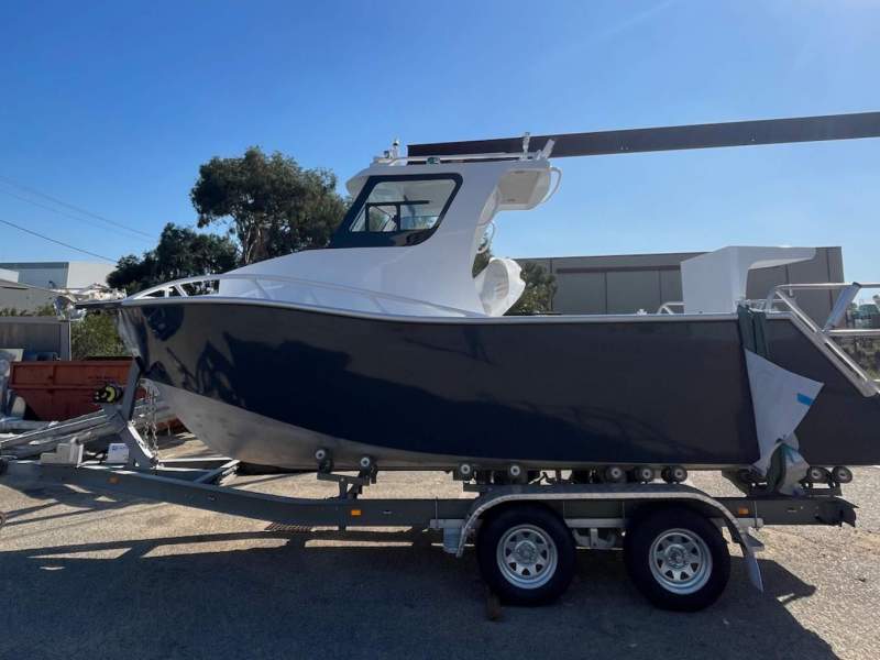 Lux Custom Boats 6100WA With added transom cage and double ladder