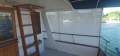 Universal 41 Flybridge Cruiser Custom extended to 44 foot.:Side covers