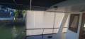 Universal 41 Flybridge Cruiser Custom extended to 44 foot.:Side covers