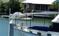 Universal 41 Flybridge Cruiser Custom extended to 44 foot.:Foredeck euro cover