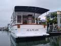 Universal 41 Flybridge Cruiser Custom extended to 44 foot.