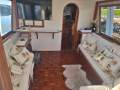Universal 41 Flybridge Cruiser Custom extended to 44 foot.:Saloon