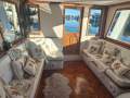 Universal 41 Flybridge Cruiser Custom extended to 44 foot.:Saloon