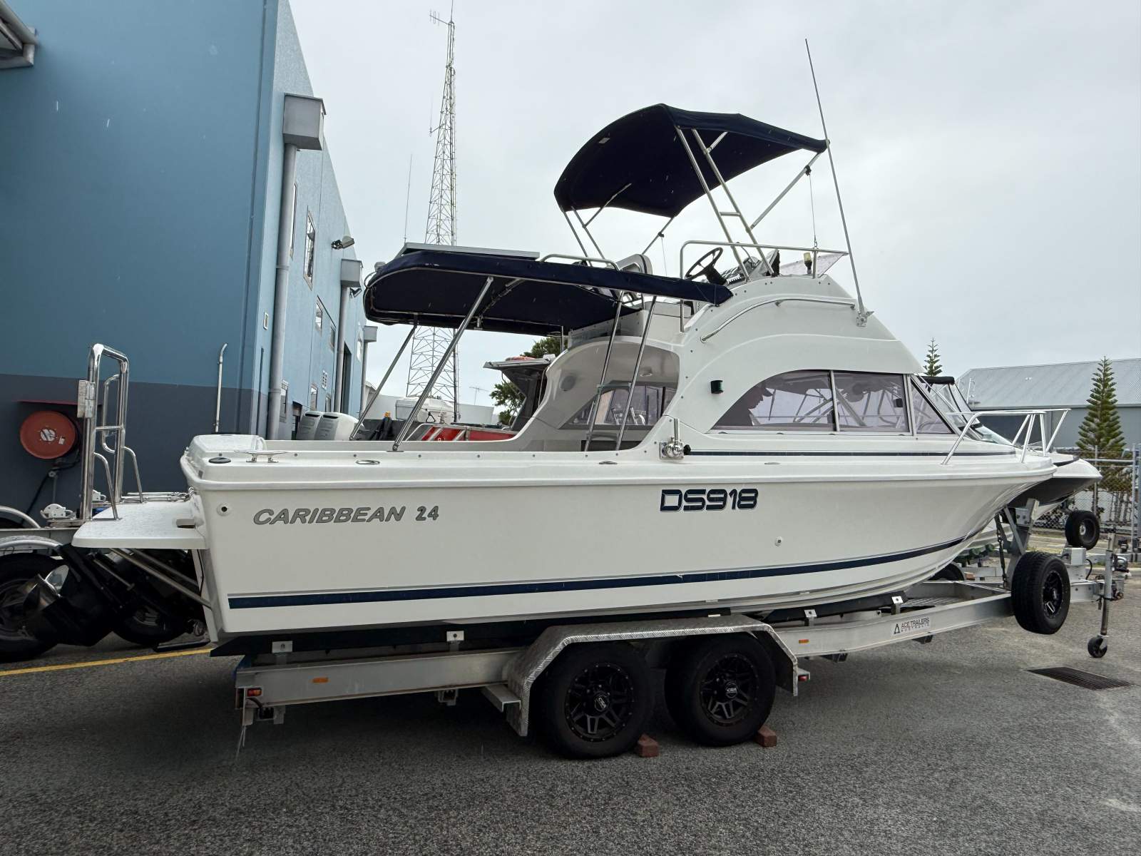 Caribbean 24 Flybridge Sports Fisherman:Also has full storm covers