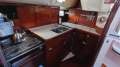 Beneteau Oceanis 440 Bluewater Practical, Comfortable, & Affordable:Galley aft stb