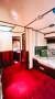 Argonaut Single Mast Sloop Motor Sailer:Looking forward from kitchen, down hallway to main and bed 2