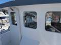 45 ft Trawler style cruiser:Front window