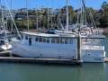 45 ft Trawler style cruiser:Berthed at WMYC ( note solar panels on aft rooftop X 5)