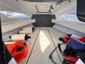 Quintrex 610 Trident Hardtop " BOATHOUSE STORAGE RACK available and TRAILER ":Cabin with infill cusion to make double bed