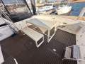Bertram Caribbean 42 " PORT COOGEE BERTH ":Light Ally Table and Bench seating easily moved around
