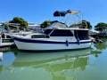 Cuddles 30 Flybridge Cruiser