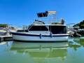 Cuddles 30 Flybridge Cruiser
