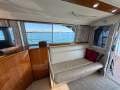 Caribbean 40 Flybridge Cruiser:This lounge converts to 3 berths