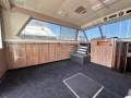 Bertram Caribbean 42 " Challenger Harbour Pen optional T. A. P ":Saloon looking Portside