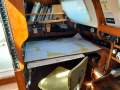 Custom:Full size chart table slides away with port quarterberth beneath