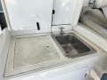 Bertram 37 Flybridge " 2 x Diesel Shaft Drives ":Cockpit sink and Fridge