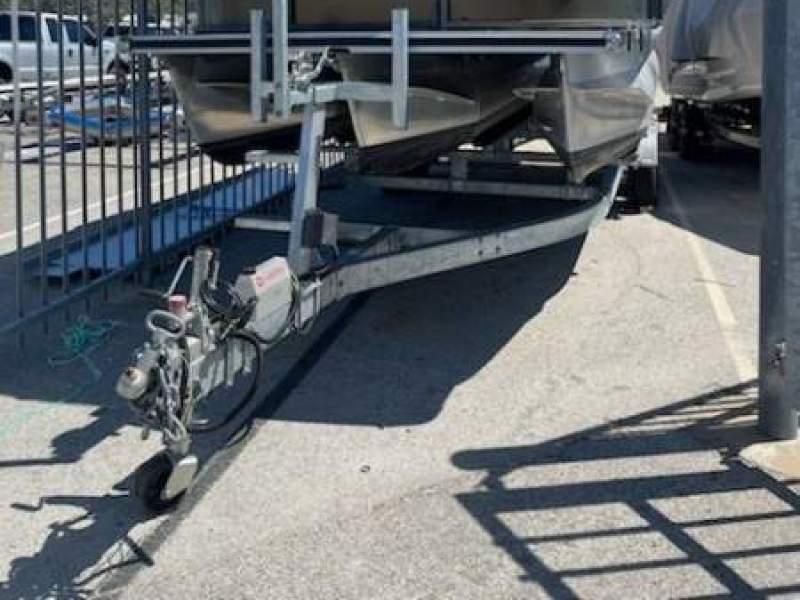 Gospel 6.9 Pontoon Barge On a solid registered trailer