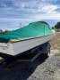 Custom fibreglass fishing boat on trailer