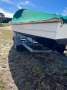 Custom fibreglass fishing boat on trailer
