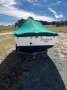 Custom fibreglass fishing boat on trailer