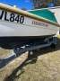 Custom fibreglass fishing boat on trailer