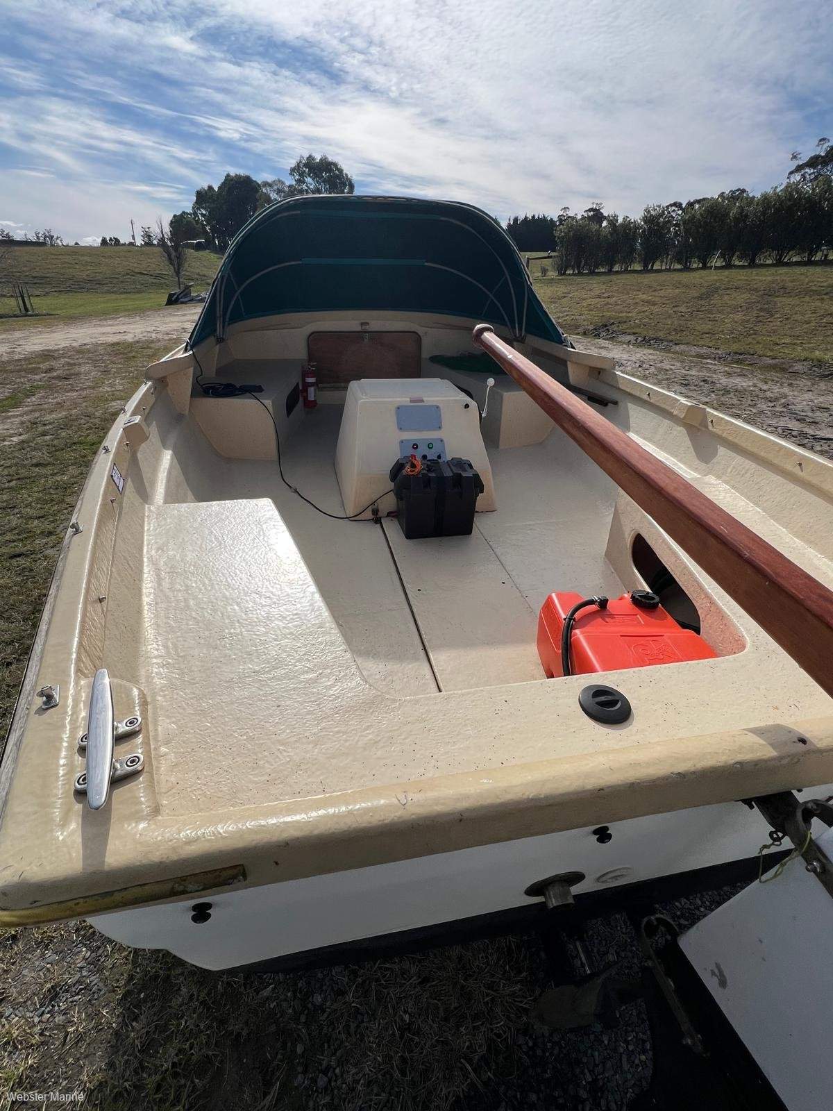Custom fibreglass fishing boat on trailer