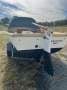 Custom fibreglass fishing boat on trailer