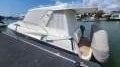 Riviera Riveria M360 Sports Cruiser M360:Boat Docked with Covers