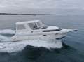 Haines Signature 850 Sportsbridge Upgraded 6.2L Mercruiser with electronic controls