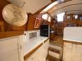 Roberts 370 Custom Cutter - Raised Saloon - Aluminium Built to Last:View from galley/forward head looking aft
