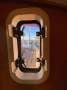 Roberts 370 Custom Cutter - Raised Saloon - Aluminium Built to Last:Peep hole to cockpit from saloon pilot berth