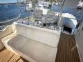 Riviera 41 Flybridge 39 extended to 41 " REBUILT ENGINES ":Flybridge view looking aft