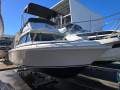 Bertram 23 Flybridge Cruiser on Trailer