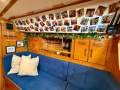 Dresport Furia 37 (39 ft) Extraordinary Cruiser ready to sail:Starboard seating with lee-sail for comfortable sleeping at sea.
