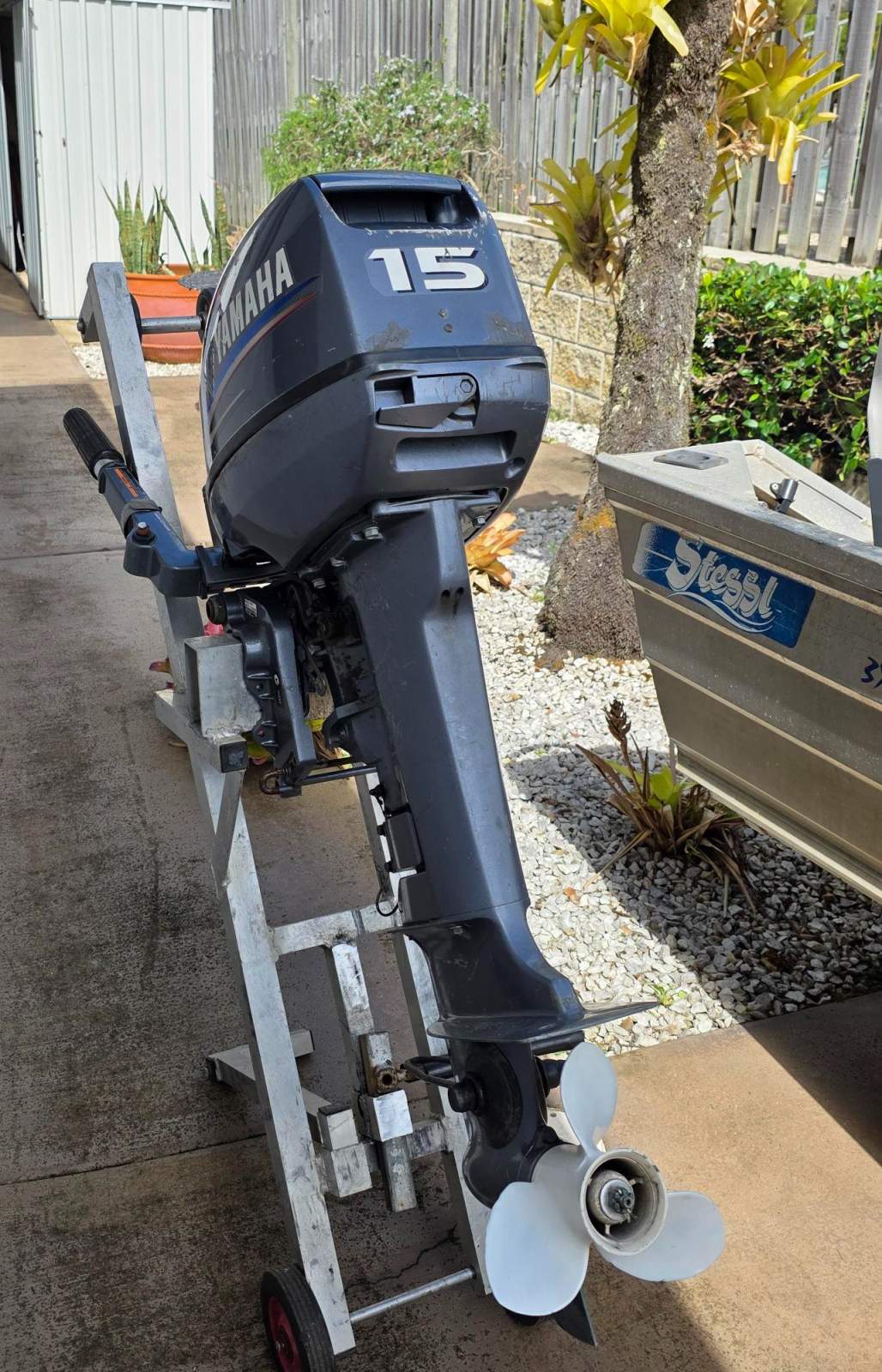 Stessl 3.7 Edgetracker Car Topper Package includes boat, trailer, loader:Engine on transport trolley