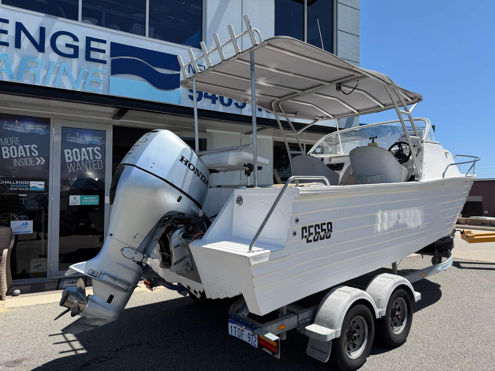 Polycraft 5.99 Frontier Cuddy Cabin - 2012 model with only 80 hours on the Honda