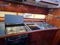 Bavaria Ocean 44 Centre Cockpit - Upgraded rigging, sails, thrusters, solent stay:In-line galley to port with stove-top and induction cooking