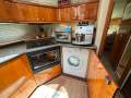 Sunseeker Manhattan 62 " Hardtop Flybridge ":Washing machine in Galley