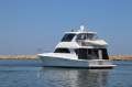 Caribbean 47 Flybridge Cruiser with Only 447 Hours