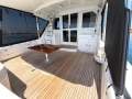 Caribbean 47 Flybridge Cruiser with Only 447 Hours