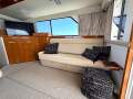 Caribbean 47 Flybridge Cruiser with Only 447 Hours