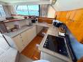 Caribbean 47 Flybridge Cruiser with Only 447 Hours