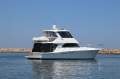 Caribbean 47 Flybridge Cruiser with Only 447 Hours