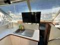 Bertram 35 Flybridge MK III " NEW ENGINES ":Galley and TV