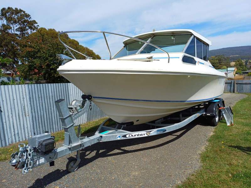 Caribbean Reef Runner 21. Only 7 engine hours on late model Mercruiser.
